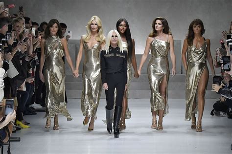 michael kors buys out versace|Michael Kors acquisition.